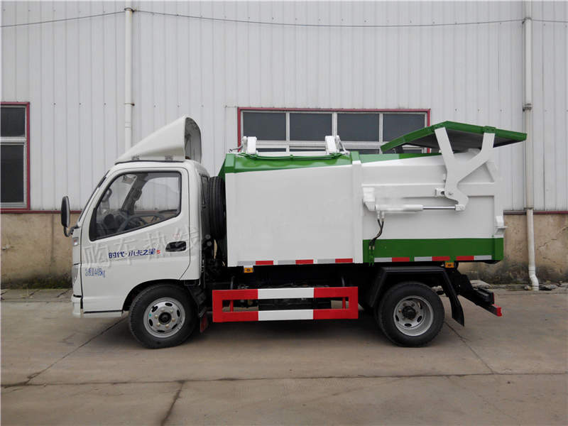 福田小卡(3方)側(cè)裝壓縮式垃圾車